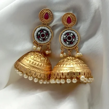 Gold-Plated Pearl Jhumka Earrings with Red Stones